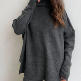 Set tricotat cu guler înalt și pantaloni